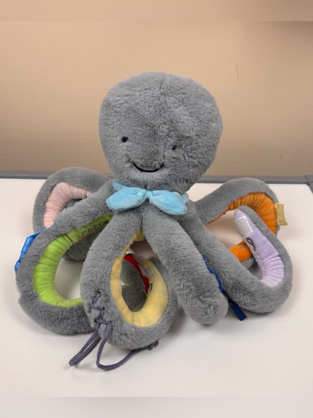 Mud Pie Octicvity Pal Plush in Grey